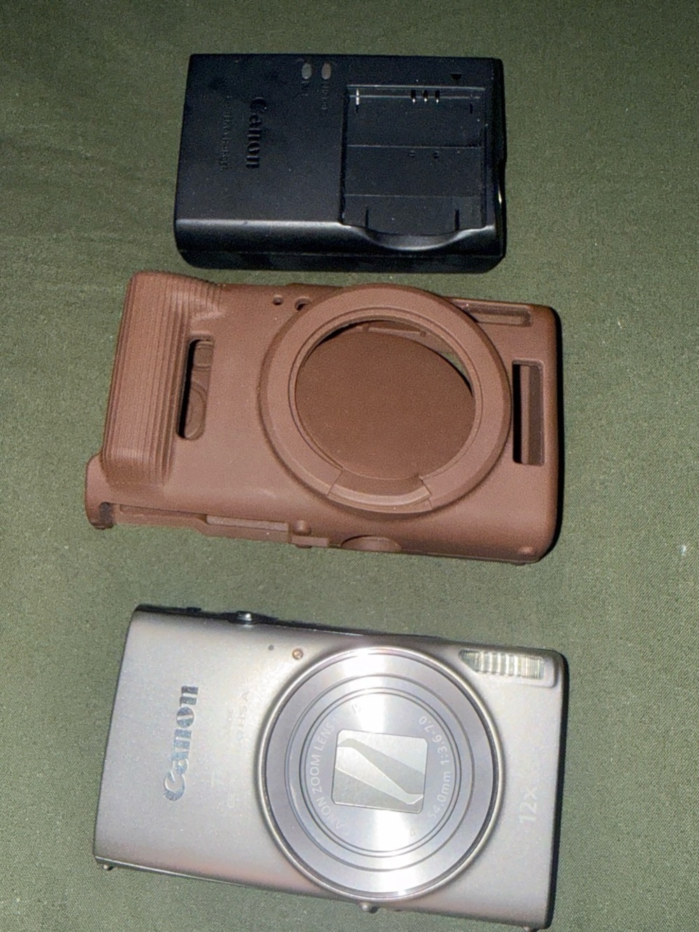 Canon Silver Compact Digital Camera with Brown Protective Case